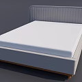 Double Bed With Upholstered Gray Headboard And White Mattress Wooden Legs