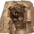 Ancient Archaeological Excavation Site With Earthen Structure Pottery Jars And Skeletal Remains