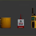 Red River Weapon Gear Display With Orange Mug And Yellow Walkie Talkie