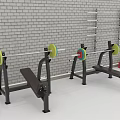 Fitness Equipment Bench Press Stations Barbells with Colored Weight Plates Brick Wall