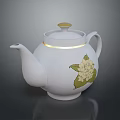 White Ceramic Teapot With Green Floral Pattern And Golden Trim Design