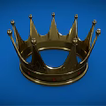 Elegant Golden Crown With Red Gemstones And Intricate Design On Blue Background