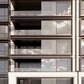 Modern Multi Story Residential Building Exterior With Glass Windows Balconies And Landscaped Water Feature Garden