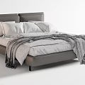 Cozy Modern Double Bed With Grey Upholstered Headboard White Pillows And Grey Blanket