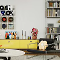 Warm Bright Modern Living Room With Black Leather Sofa Stylish Wall Art And Natural Light