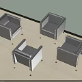 Modern Gray Single Sofa With Sleek Metal Legs In Contemporary Living Space