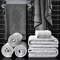 High Quality Absorbent Cotton Bath Towels Stacked And Rolled In Modern Bathroom