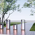Modern Outdoor Pillar Lights on Wooden Deck with Trees Grass and Water View