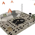 Beige Curved Sofa with Green Cushions and Black Round Coffee Table Set on Spotted Rug