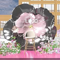 Giant Flower Shaped Photo Check In Spot With Pink Black Petals And White Chair