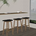 Modern Bar Stools with Wooden Frame and Black Cushion in Bright Room Setting