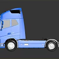 Blue Volvo Truck Model Featuring Detailed Cab And Reflection On Dark Surface