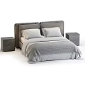 Double Bed with Brown and Gray Headboard White Pillows Comfortable Bedding and Matching Nightstands