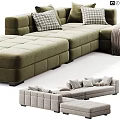 Beige Fabric Double Sofa With Checkered Pillows Cozy Throw Blanket And Ottoman