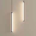 Modern Pendant Lights with Elongated Sleek Design White Light Illumination in Minimalist Interior Setting