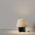 Modern Minimalist Beige Linen Shade Table Lamp With Black Metal Base Soft Lighting