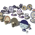 Decorative Tableware Set With Teapots Plates Mugs And Bowls Featuring Floral Patterns 3d model
