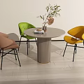 Round Dining Table With Ribbed Cylindrical Leg And Colorful Upholstered Chairs Set 3d model