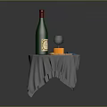 Small Table With Gray Tablecloth Green Wine Bottle Wine Glass And Cheese