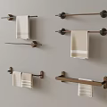 Different Designed Wall Mounted Towel Racks With Hanging Towels On Light Wall
