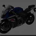 Sporty Suzuki Motorcycle With Blue And Black Streamlined Design And Modern Stripes