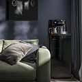 Sunlit Modern Living Room With Green Sofa Black Cabinet Holding Coffee Machine And Kettle