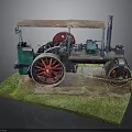 Vintage Steam Roller Model With Detailed Green Red Design On Grass Base
