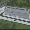 Modern Industrial Factory Building With Multi Story Structure Flat Roof Green Surroundings And Road Access