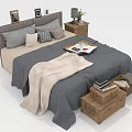 Double Bed With Gray Beige Bedding Pillows Blanket Nightstands Table Lamp Green Plant And Wooden Chest With Books