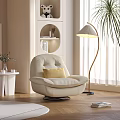 Beige Single Sofa with Yellow Pillow Floor Lamp and Bookshelf in Modern Living Room
