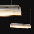 Modern Transparent Pendant Lights With Sleek Metallic Frame And Warm Glow Design