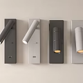 Modern Wall Lamps with Sleek Design and Different Finishes Mounted on Light Colored Wall