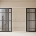 Black Sliding Doors With Vertical Slats Against Light Colored Wall And Decorative Vases