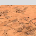 Vast Red Desert Landscape With Undulating Sand Dunes And Black Traces On Arid Ground