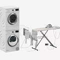 Stacked White Washing Machines with Clothes Drying Rack Iron and Hanging Clothes