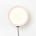 Modern Beige Oval Wall Lamp Mounted on Wall with Soft Warm Glow
