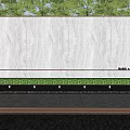Outdoor Grey Stone Feature Wall With Lush Greenery Water Feature And Illuminated Lights