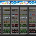 Multi Door Commercial Refrigerator Freezers Display Filled With Assorted Bottled Beverages