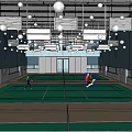 Indoor Badminton Court With Green Surface Two Players Playing Bright Lighting Blue Walls And Windows