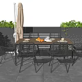 Outdoor Patio Table and Chair Set with Green Plants and Umbrella on Gray Tiles