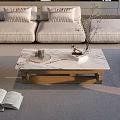 Marble and Black Glass Coffee Table with Wooden Frame and Books Glasses in Living Room