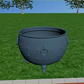 Gray Fireplace Cauldron With Three Legs And Side Handles On Green Grass With Trees