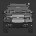 Silver Off Road Pickup Truck With Roof Rack And Orange Cargo On Top