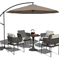 Stylish Outdoor Table With Cantilever Umbrella Rattan Chairs And Beige Cushions