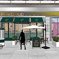Vibrant Commercial Street With Modern Multi Story Buildings Storefronts And Pedestrians Lively Atmosphere