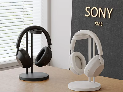 Sony XM5 Headphones Black And White On Stands On Wooden Table In Modern Indoor Setting 3d model
