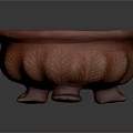 Decorative Red Ceramic Pot With Carved Leaf Patterns And Three Feet
