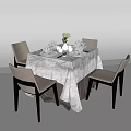 Dining Table Set With White Tablecloth Four Chairs Light Seats Black Legs Tableware Vase Flowers