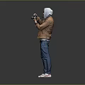 Man With Hoodie In Brown Jacket Blue Jeans Taking Photo With Camera On Gray Background