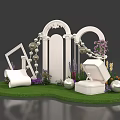 Floral Installation with White Arch Picture Frame Jewelry Box on Green Grass and Purple Flowers